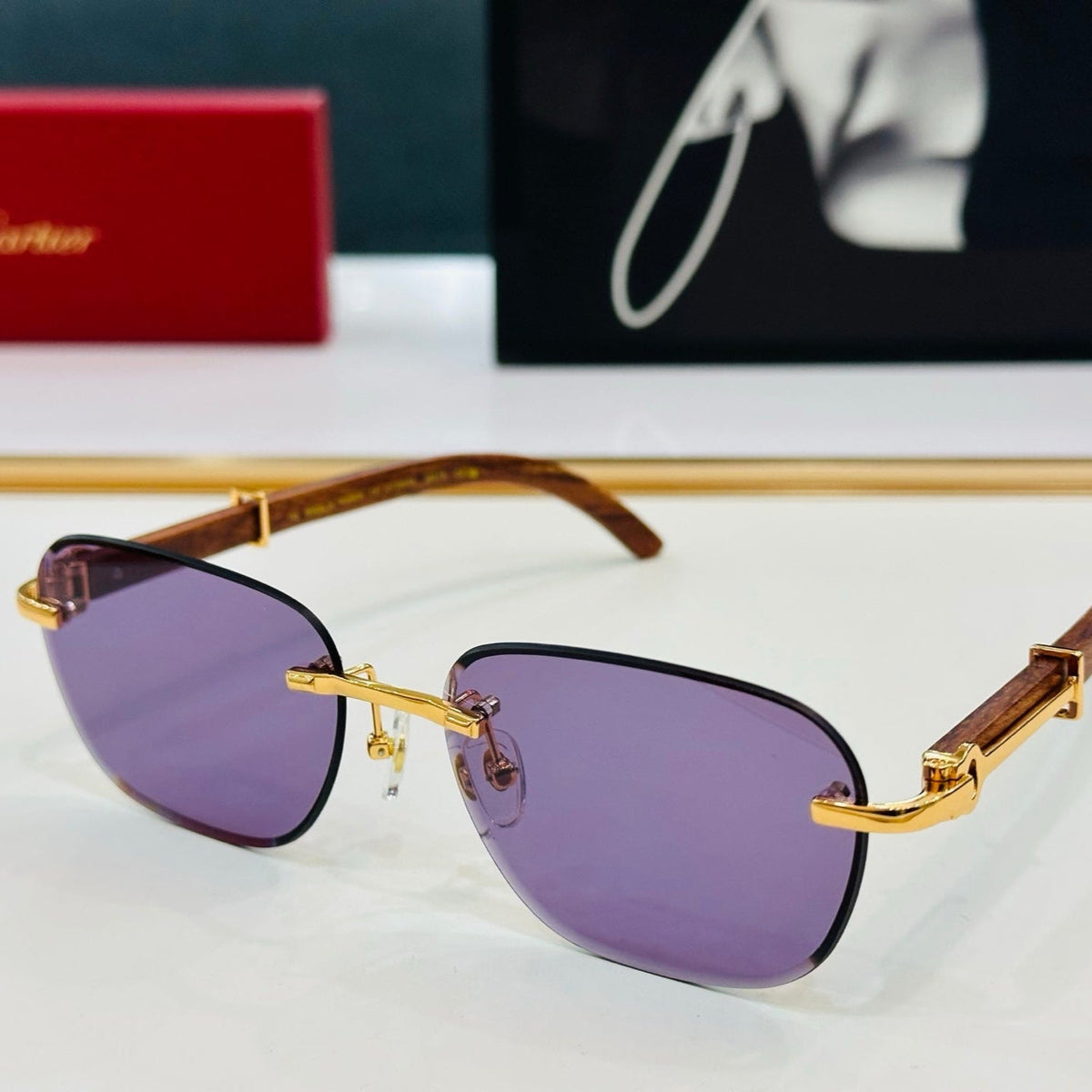 C DE RIMLESS SQUARE FRAME SUNGLASSES CT0605S IN METAL AND WOODEN